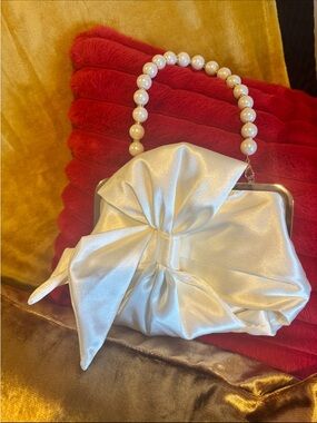 Pearl-Handle Ivory Satin Bow Clutch